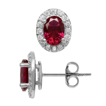 Created 1.7 Ctw Oval 7x5 mm Red Ruby 925 Sterling Silver Halo Stud Earrings